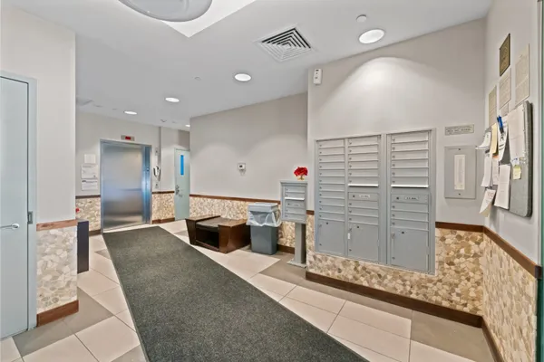a large room with lots of wooden cabinets