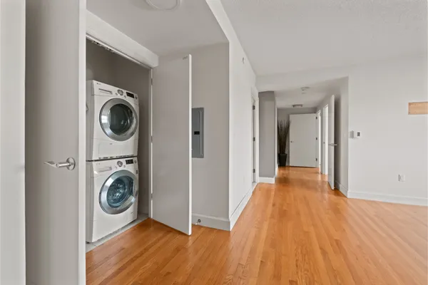a kitchen with stainless steel appliances granite countertop a stove and a microwave
