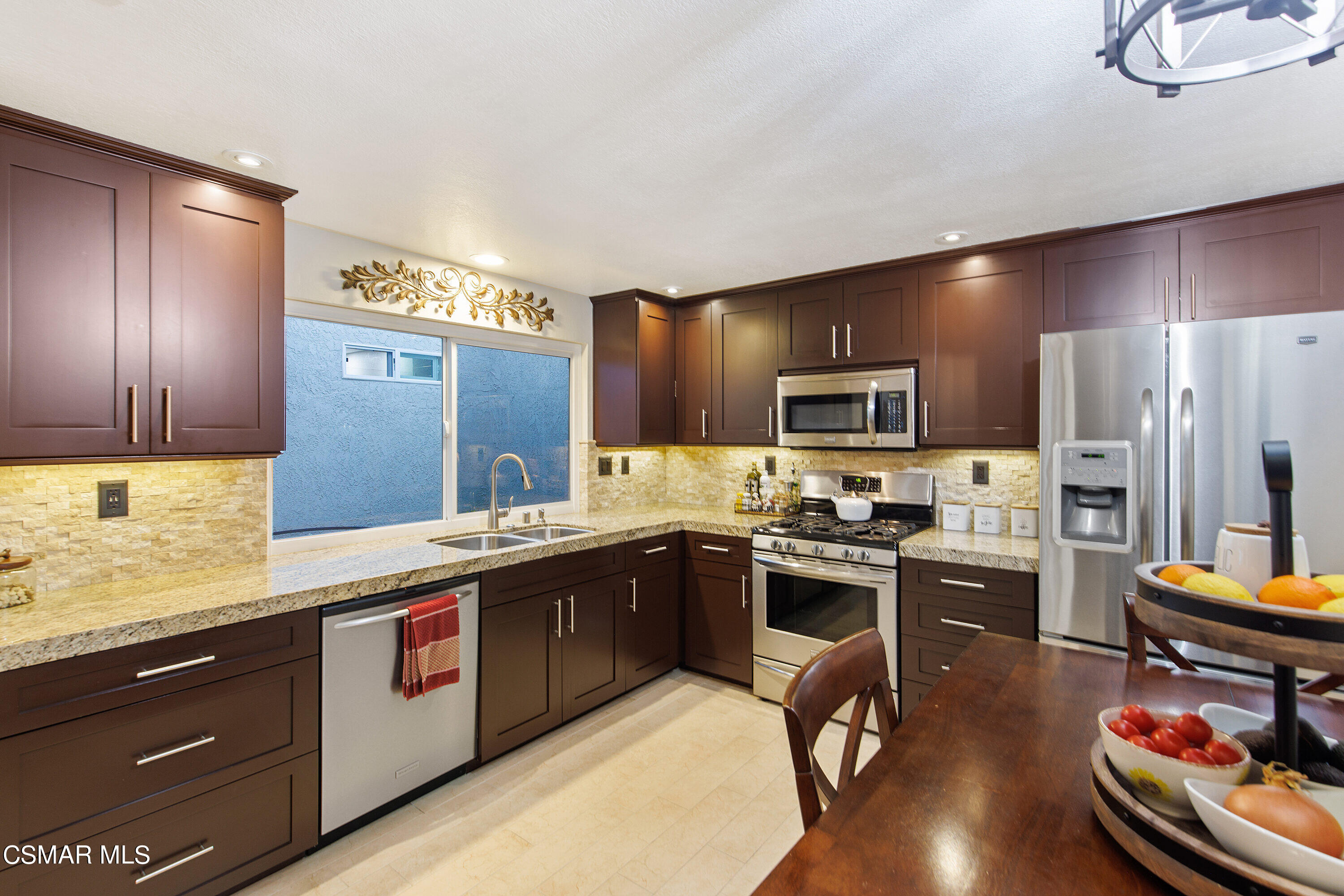 773 Congressional Road Simi Valley, CA 93065 - Photo 18 of 39 a kitchen with cabinets a sink and appliances
