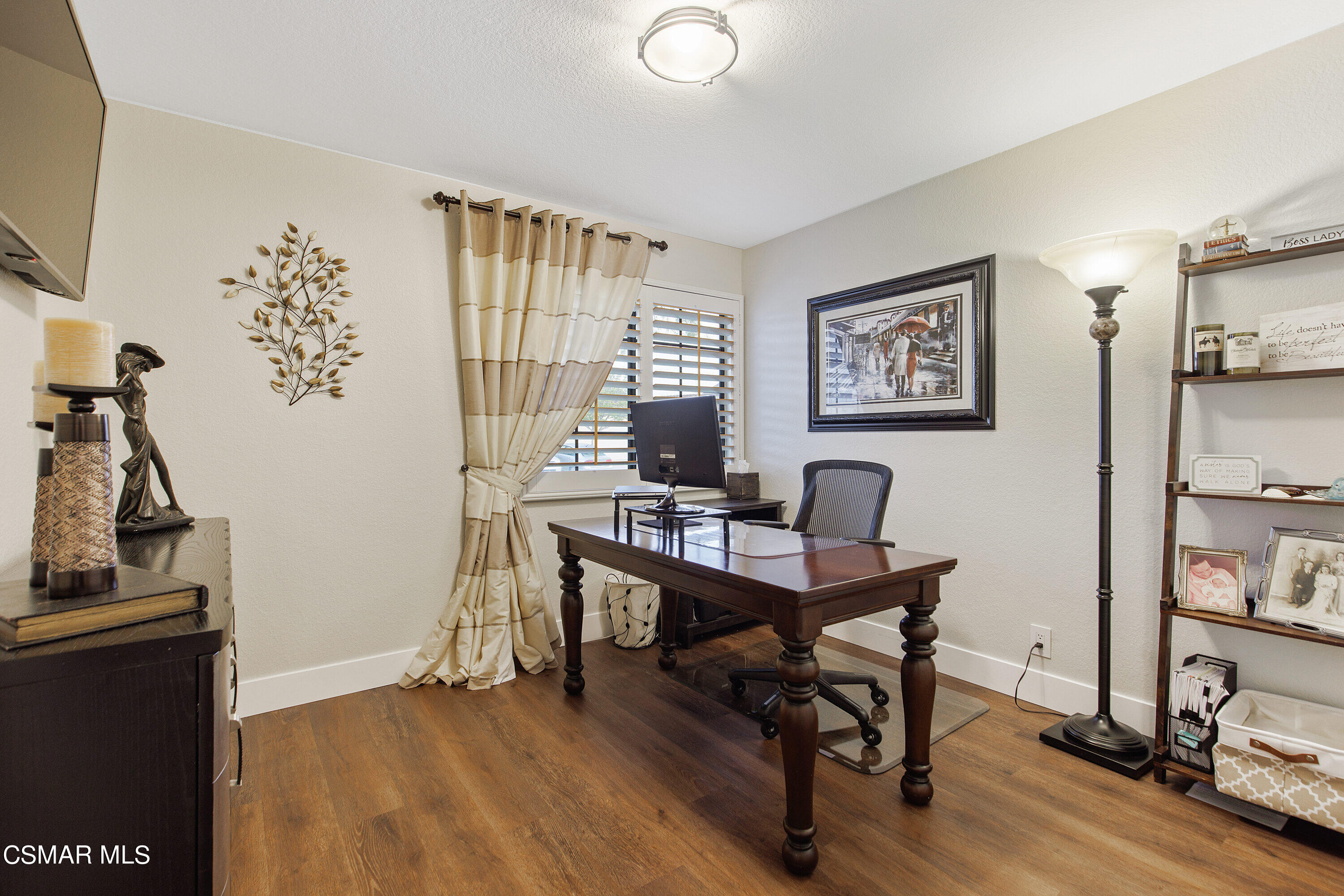 773 Congressional Road Simi Valley, CA 93065 - Photo 21 of 39 a view of a workspace with furniture and a window