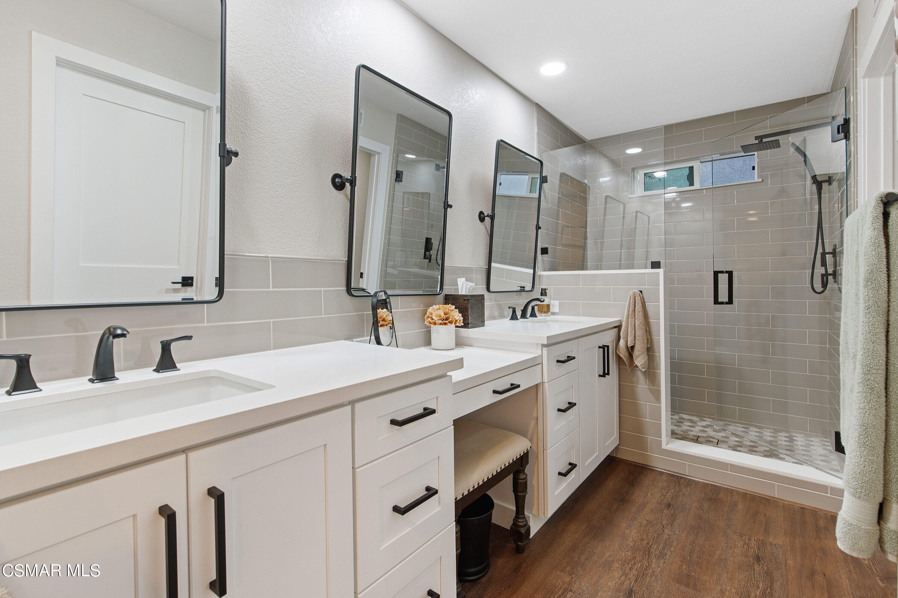 773 Congressional Road Simi Valley, CA 93065 - Photo 27 of 39 a bathroom with a double vanity sink mirror double and shower