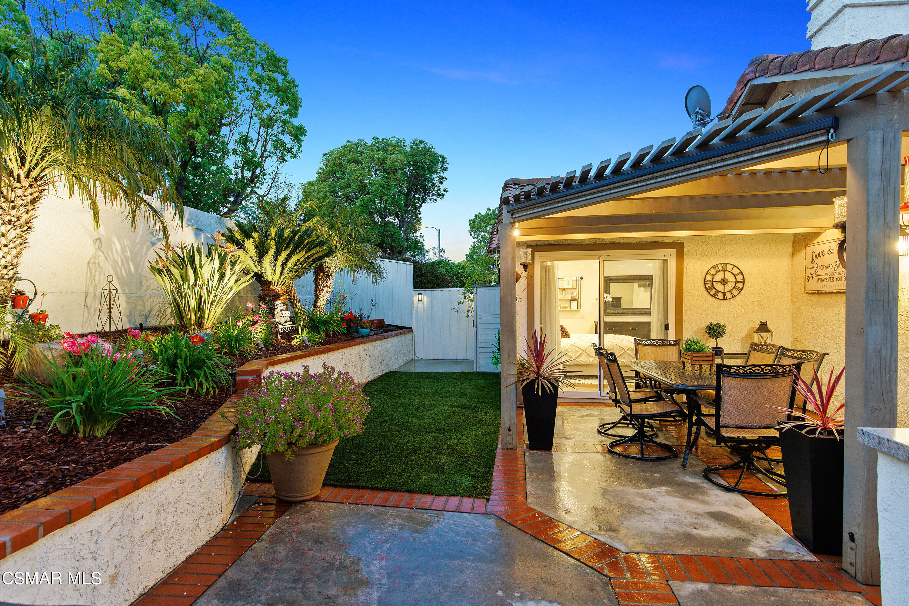 773 Congressional Road Simi Valley, CA 93065 - Photo 33 of 39 a view of a patio with table and chairs and potted plants