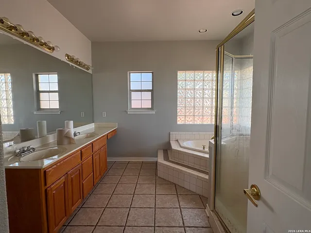 a bathroom with a bathtub sink and toilet