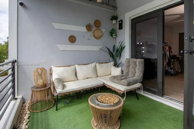 a living room with furniture and a table