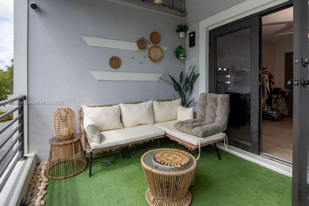 2061 Washington Avenue, Unit 4 Opa-Locka, FL 33054 - Photo 20 of 23 a living room with furniture and a table