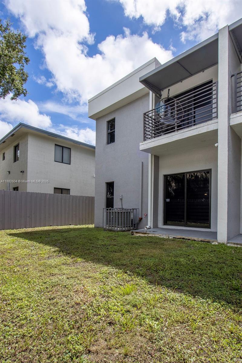 2061 Washington Avenue, Unit 4 Opa-Locka, FL 33054 - Photo 22 of 23 a view of a backyard of the house