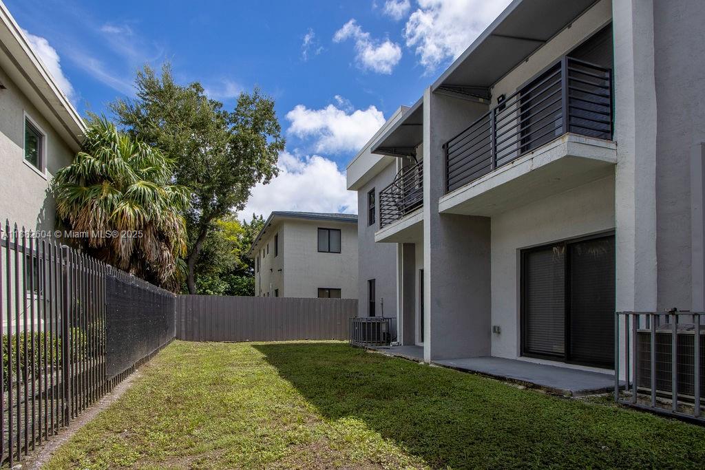 2061 Washington Avenue, Unit 4 Opa-Locka, FL 33054 - Photo 23 of 23 a view of back yard of the house
