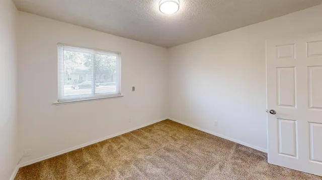 an empty room with a window