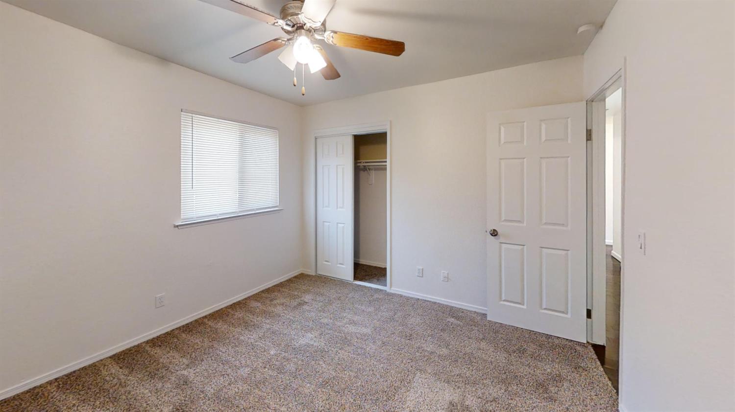 495 Pacific Street Coalinga, CA 93210 - Photo 30 of 33 a view of an empty room with a window