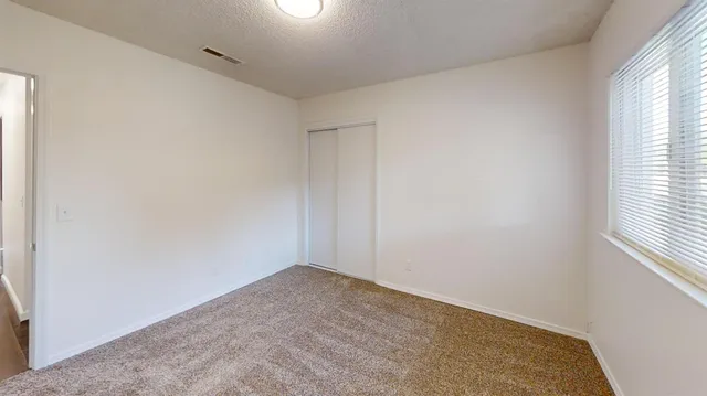 an empty room with a window