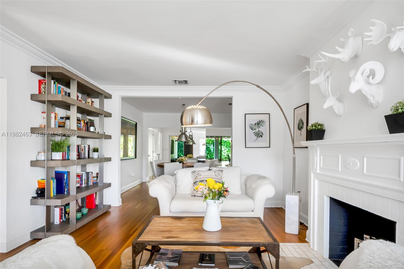 540 Southwest 27th Road Miami, FL 33129 - Photo 11 of 54 a living room with furniture and a fireplace