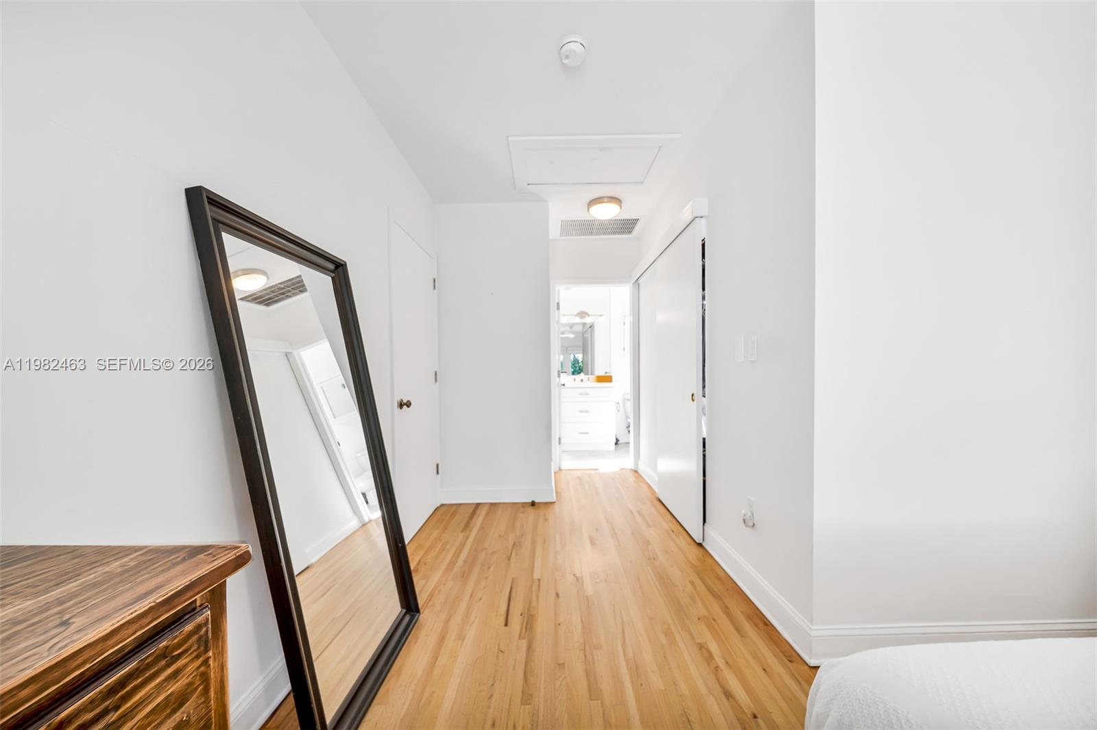 540 Southwest 27th Road Miami, FL 33129 - Photo 28 of 54 a view of a hallway and wooden floor