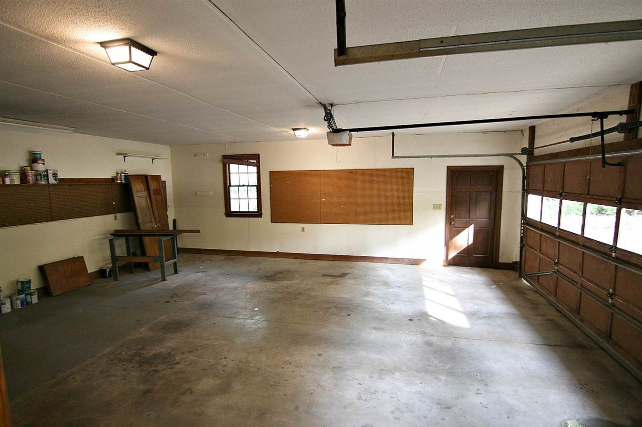 2816 Mattlyn Court Raleigh, NC 27613 - Photo 20 of 25 Oversized -- 26x24 Garage -- plenty of room for a Workshop. There is a Walk-thru Service Door. Garage