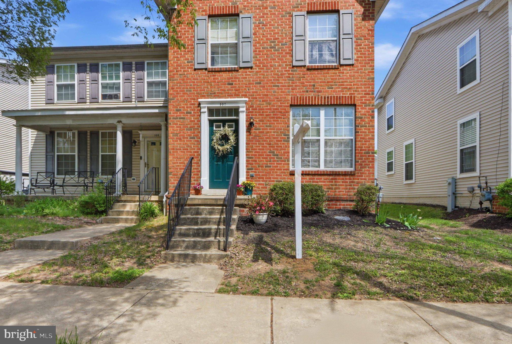 907 Myrtle Avenue Baltimore, MD 21201 - Photo 1 of 28 a front view of a house with garden