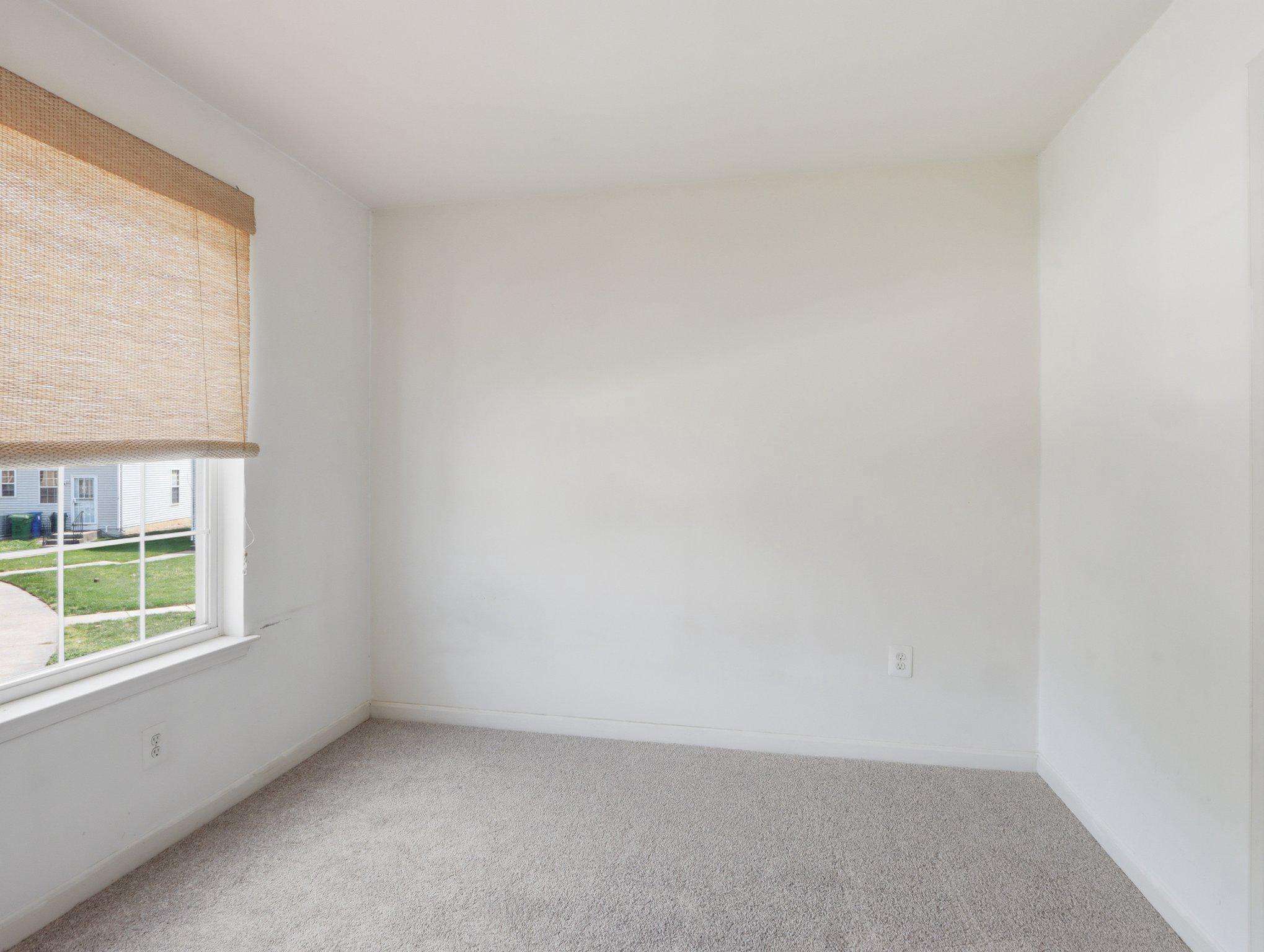 907 Myrtle Avenue Baltimore, MD 21201 - Photo 20 of 28 an empty room with a window