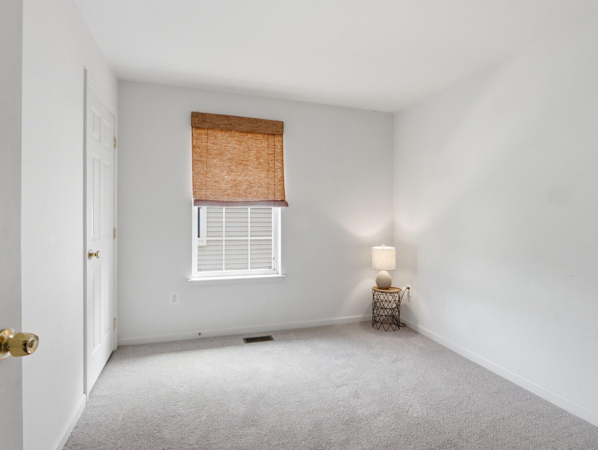 907 Myrtle Avenue Baltimore, MD 21201 - Photo 21 of 28 an empty room with a window