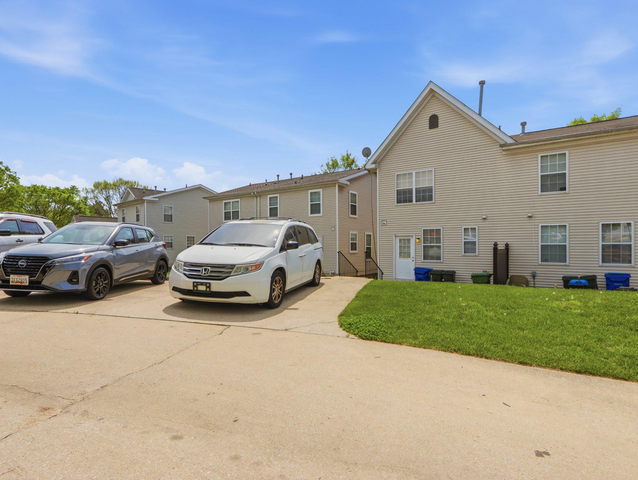 907 Myrtle Avenue Baltimore, MD 21201 - Photo 6 of 28 a view of car parked in front of house