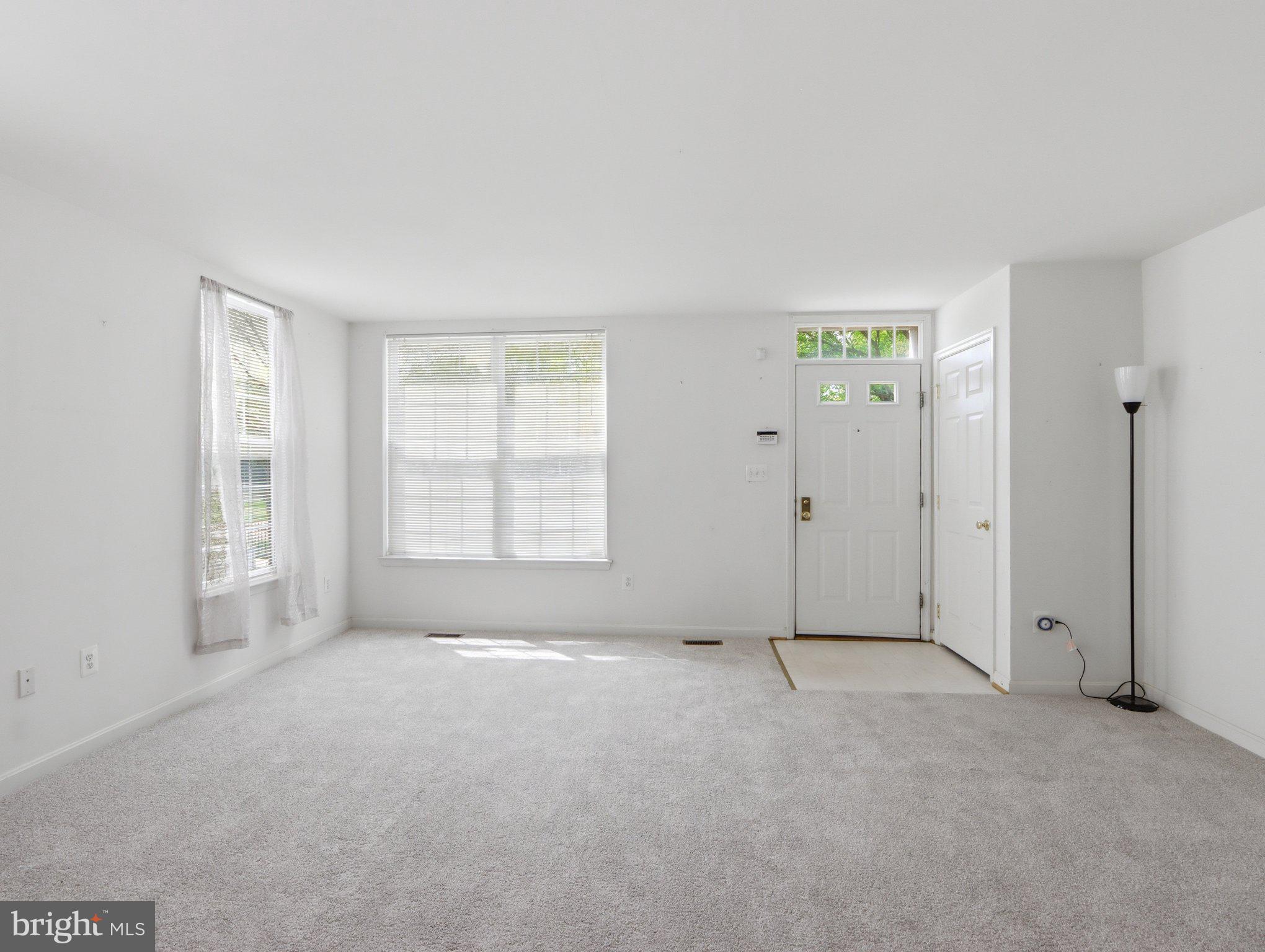 907 Myrtle Avenue Baltimore, MD 21201 - Photo 9 of 28 a view of an empty room with a window