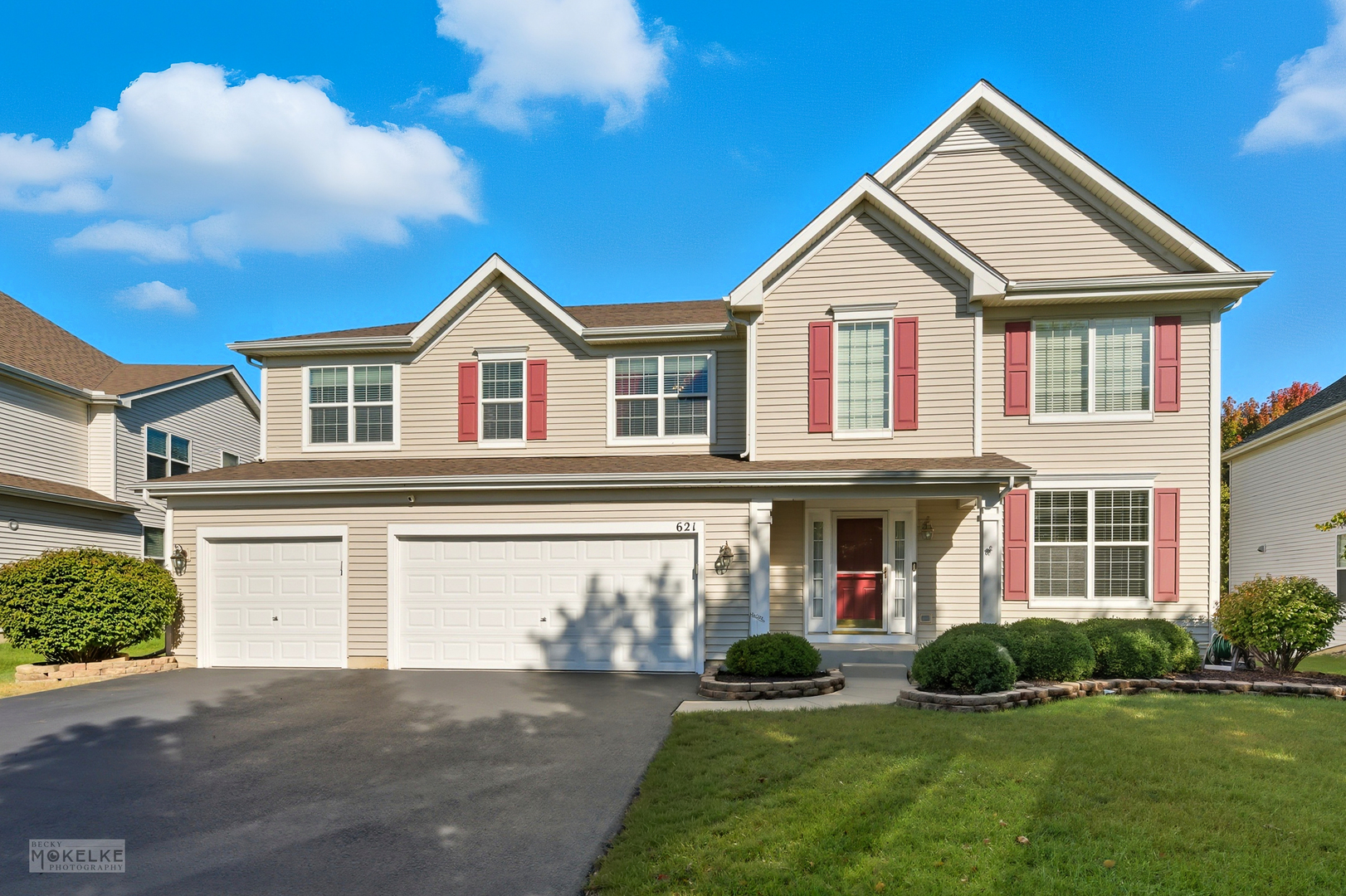 621 Mansfield Way Oswego, IL 60543 - Photo 1 of 37 a front view of a house with a yard and garage
