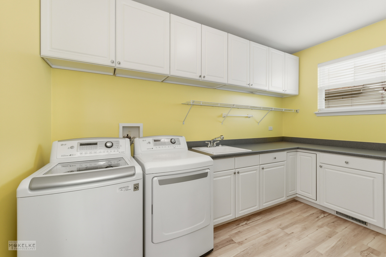 621 Mansfield Way Oswego, IL 60543 - Photo 13 of 37 a utility room with dryer and washer