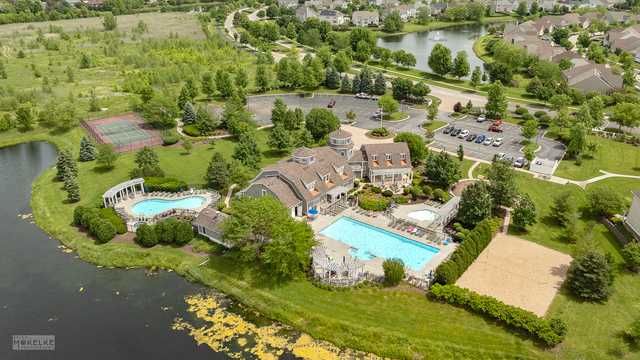 621 Mansfield Way Oswego, IL 60543 - Photo 30 of 37 an aerial view of a house with a yard