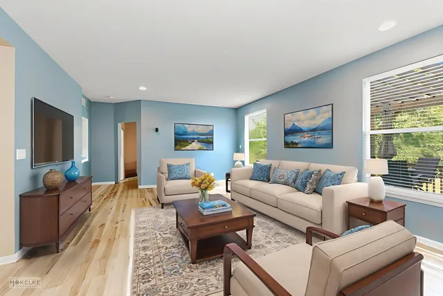 a living room with furniture and a window