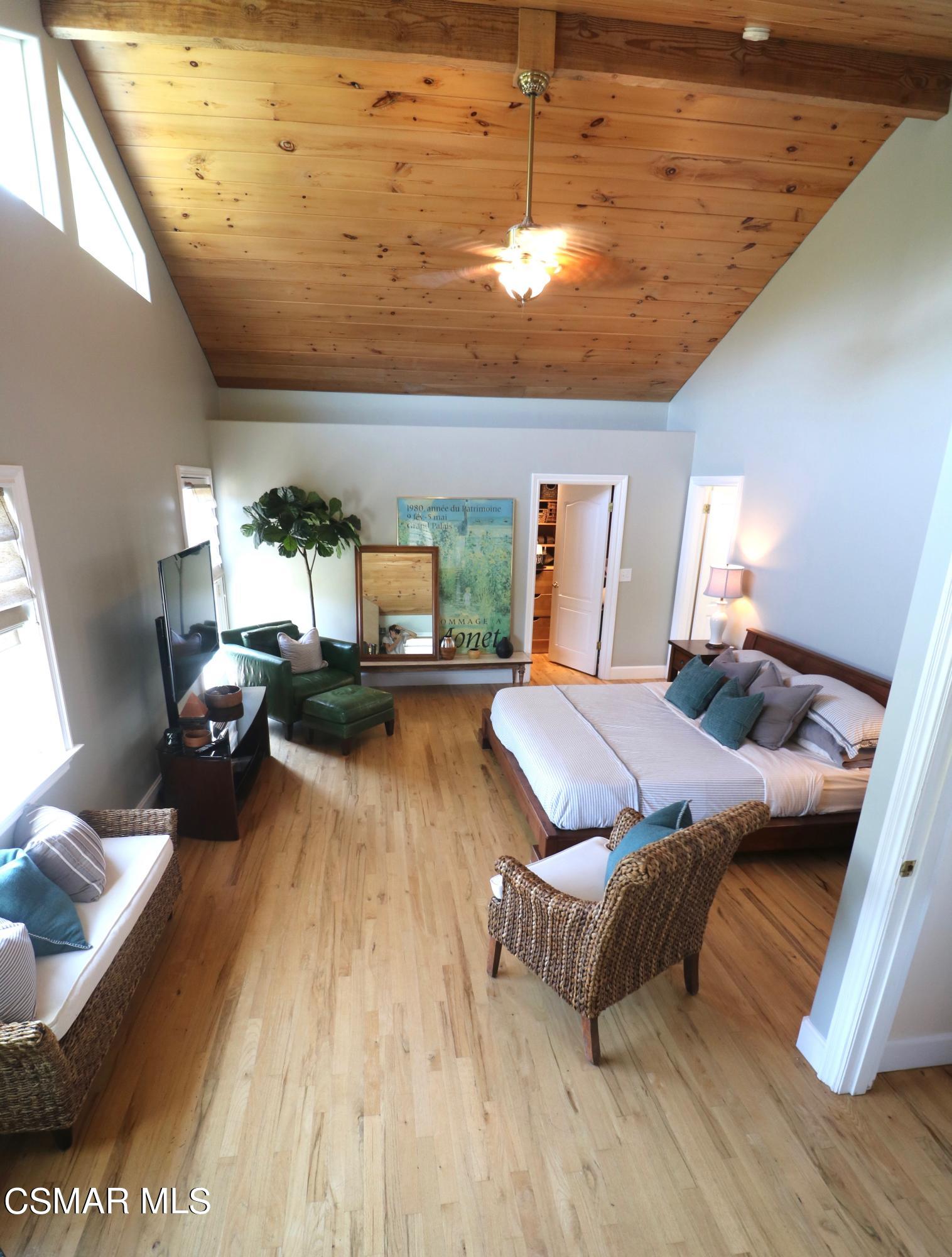4608 Apricot Road Simi Valley, CA 93063 - Photo 12 of 37 a bedroom with furniture and a wooden floor