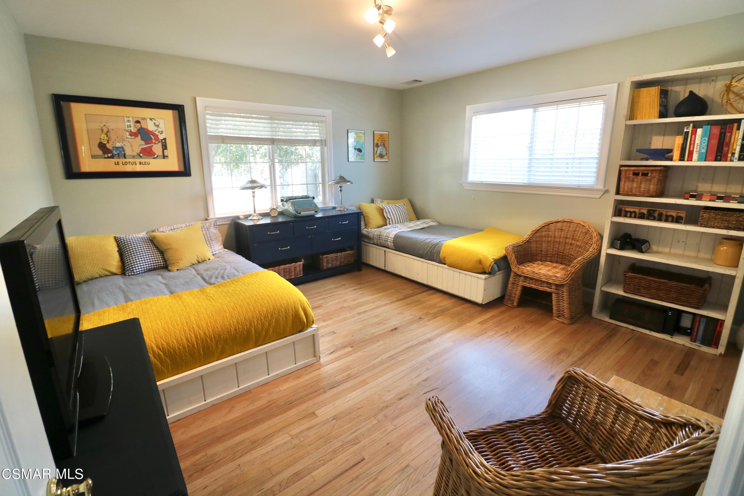 4608 Apricot Road Simi Valley, CA 93063 - Photo 21 of 37 a bedroom with furniture and wooden floor