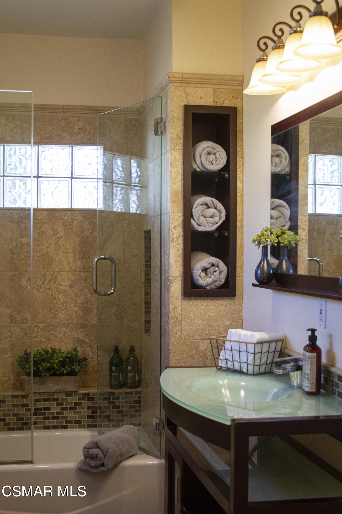 4608 Apricot Road Simi Valley, CA 93063 - Photo 27 of 37 a bathroom with a sink and a mirror