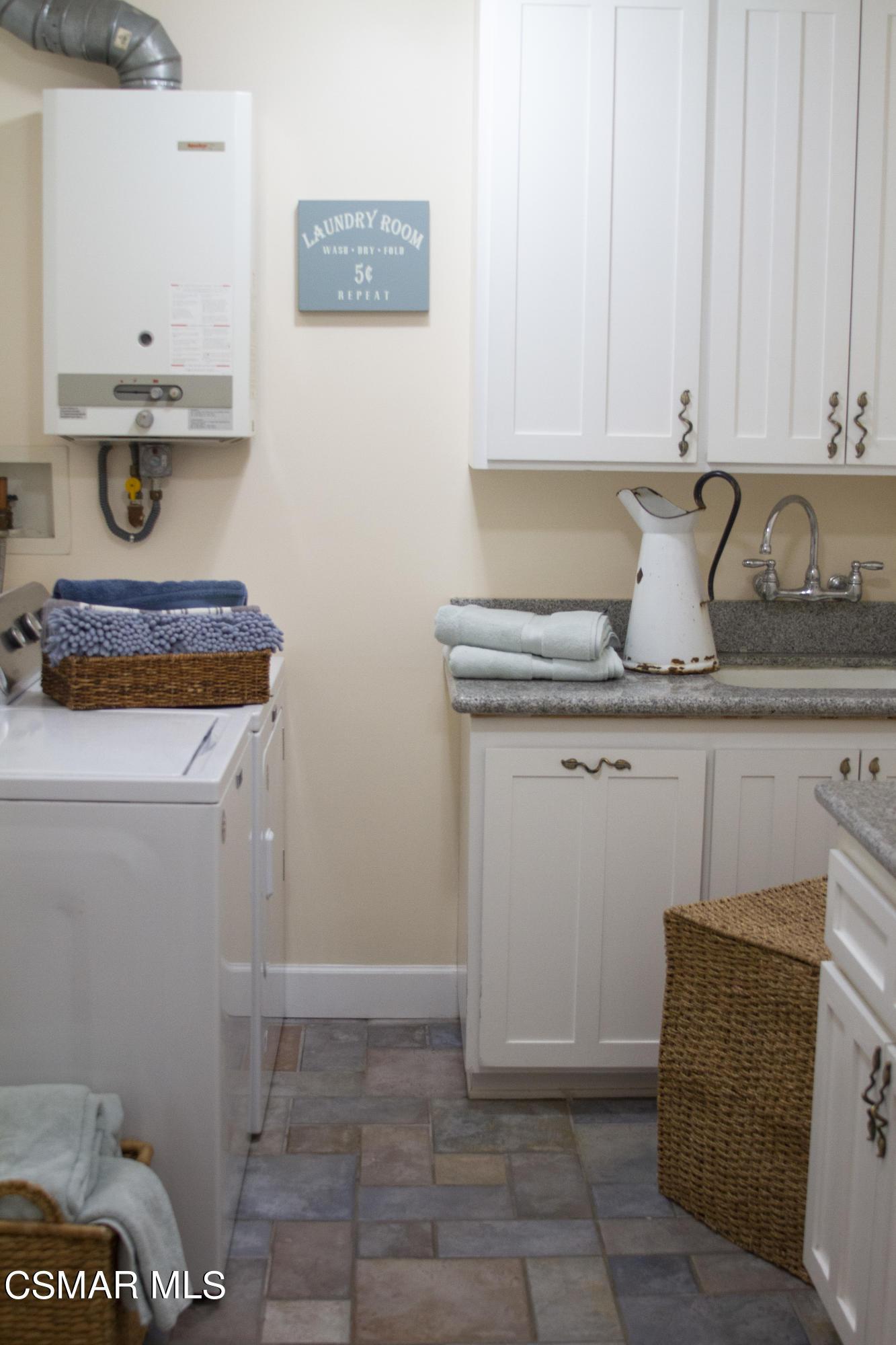 4608 Apricot Road Simi Valley, CA 93063 - Photo 30 of 37 a view of storage and utility room with washer and dryer