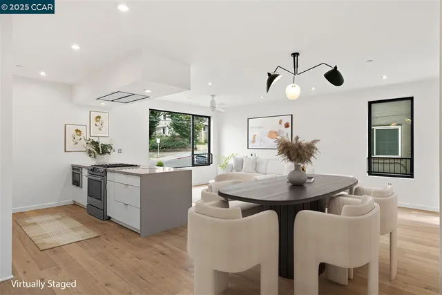 a dining room with furniture and window