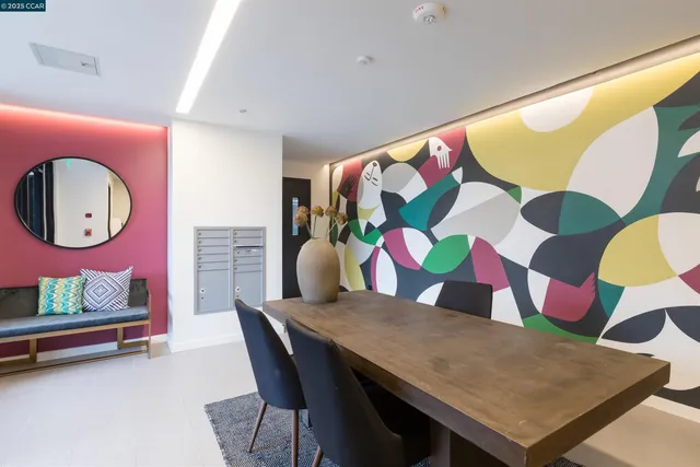a view of a dining room with furniture and rug