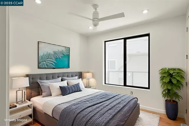 a bedroom with bed and a window