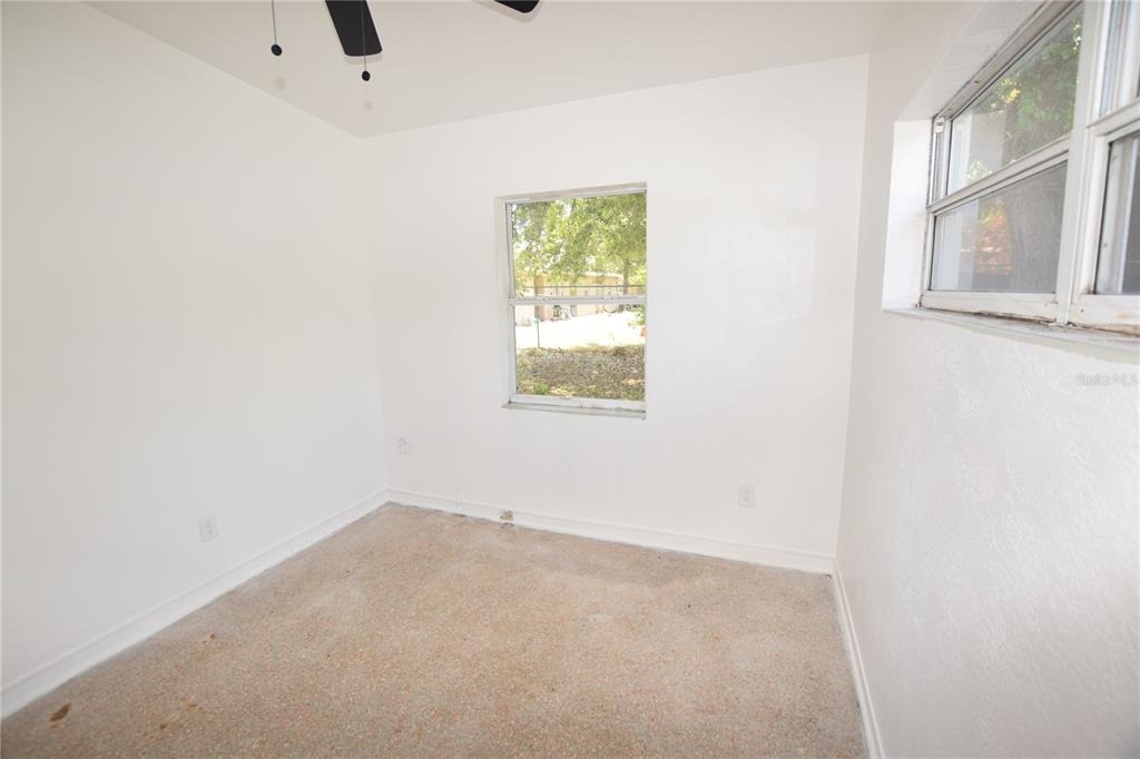 104 West Lancaster Road Orlando, FL 32809 - Photo 18 of 24 an empty room with a window