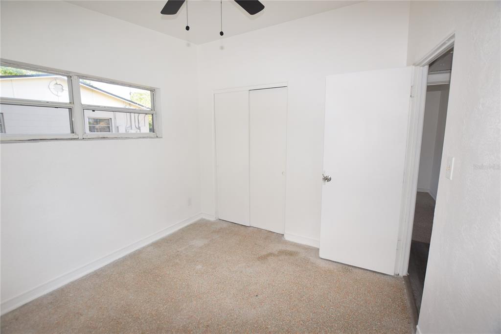 104 West Lancaster Road Orlando, FL 32809 - Photo 20 of 24 a view of an empty room with a window
