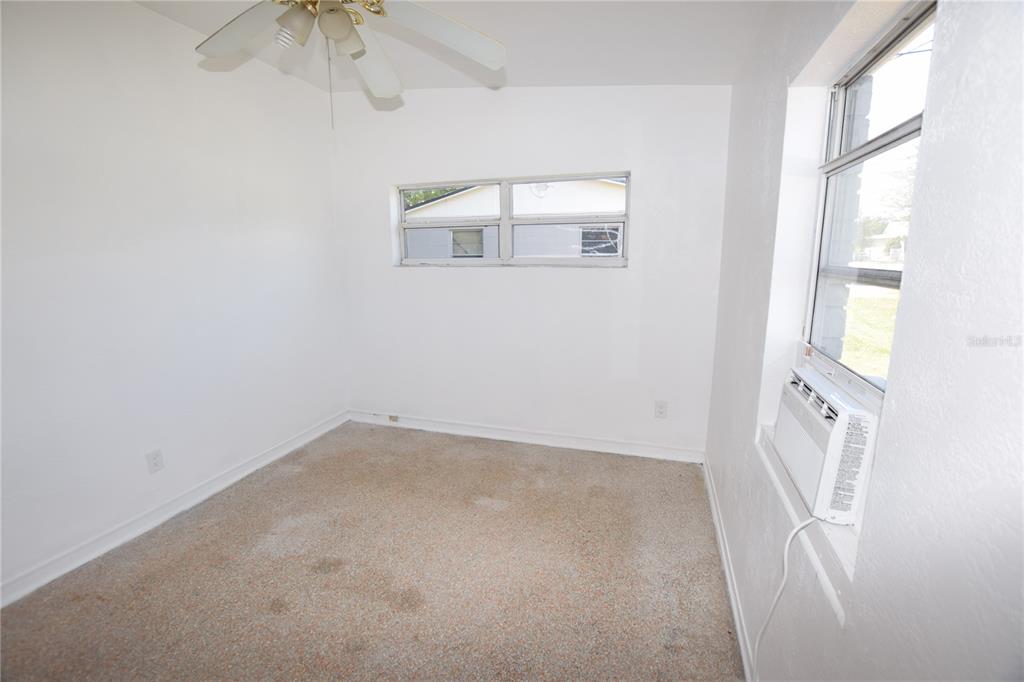 104 West Lancaster Road Orlando, FL 32809 - Photo 22 of 24 an empty room with a window