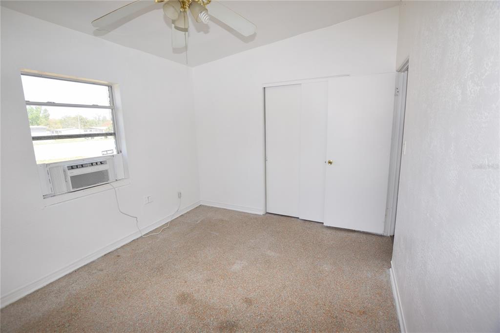 104 West Lancaster Road Orlando, FL 32809 - Photo 24 of 24 an empty room with a window