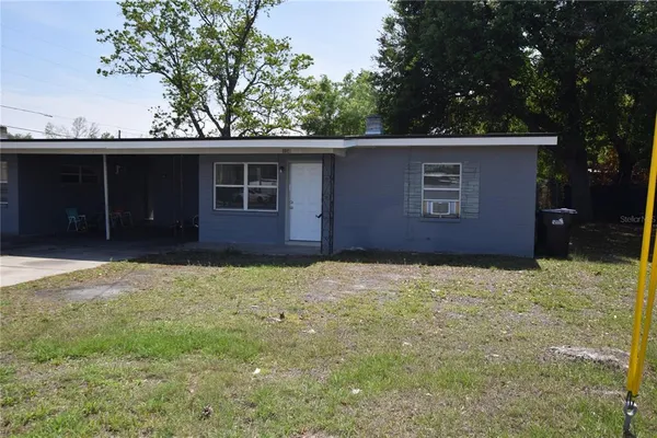 front view of a house and a yard