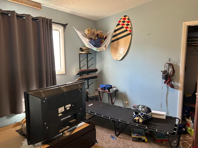 a room with furniture and a mirror