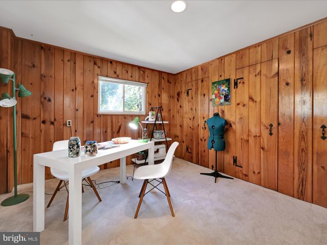a view of a livingroom with furniture and window