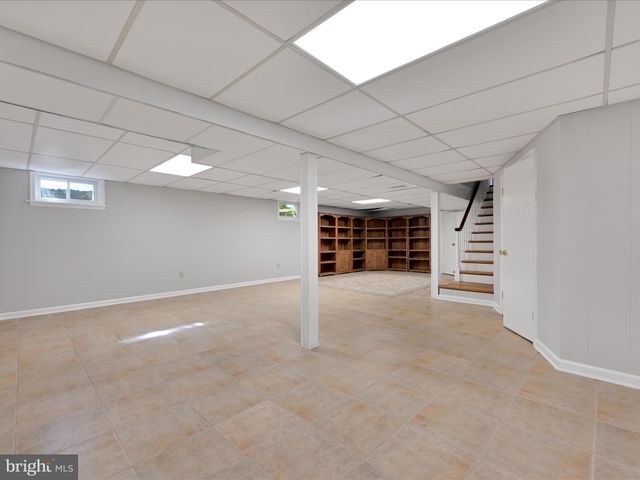 a view of an empty room with a garage