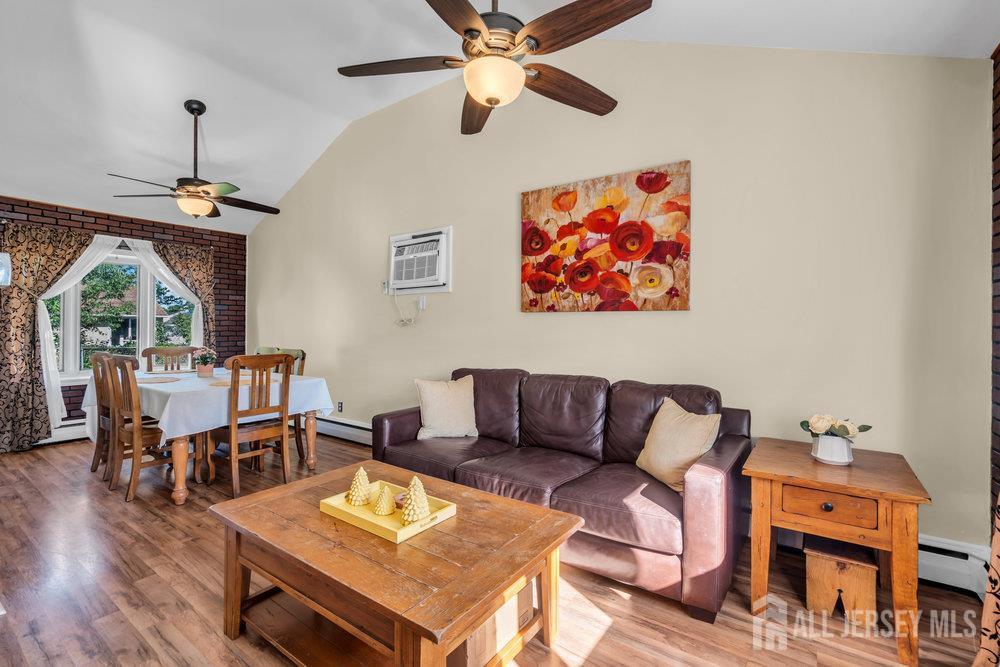 73 Webb Drive Fords, NJ 08863 - Photo 14 of 65 a living room with furniture and wooden floor