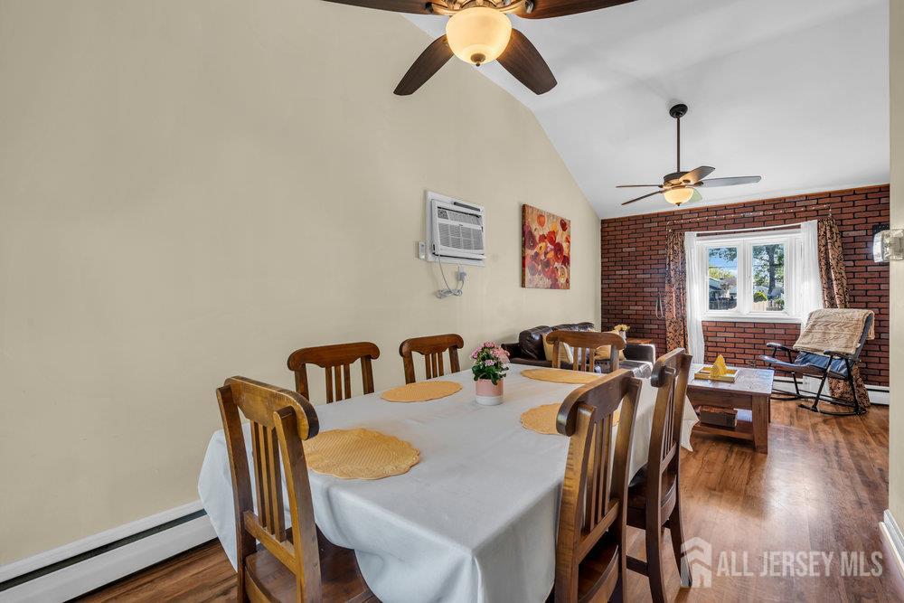 73 Webb Drive Fords, NJ 08863 - Photo 20 of 65 a view of a dining room with furniture window and wooden floor