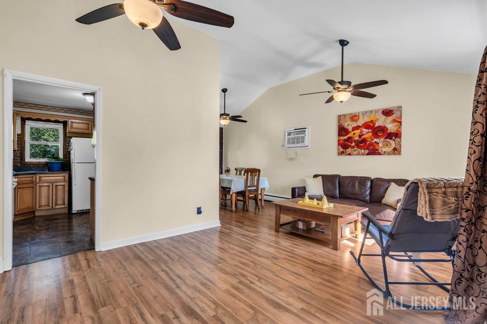 73 Webb Drive Fords, NJ 08863 - Photo 21 of 65 a living room with furniture and a wooden floor