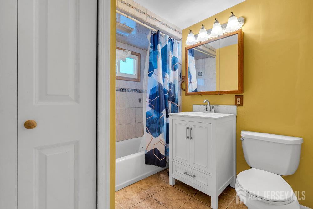 73 Webb Drive Fords, NJ 08863 - Photo 36 of 65 a bathroom with a sink a toilet and shower