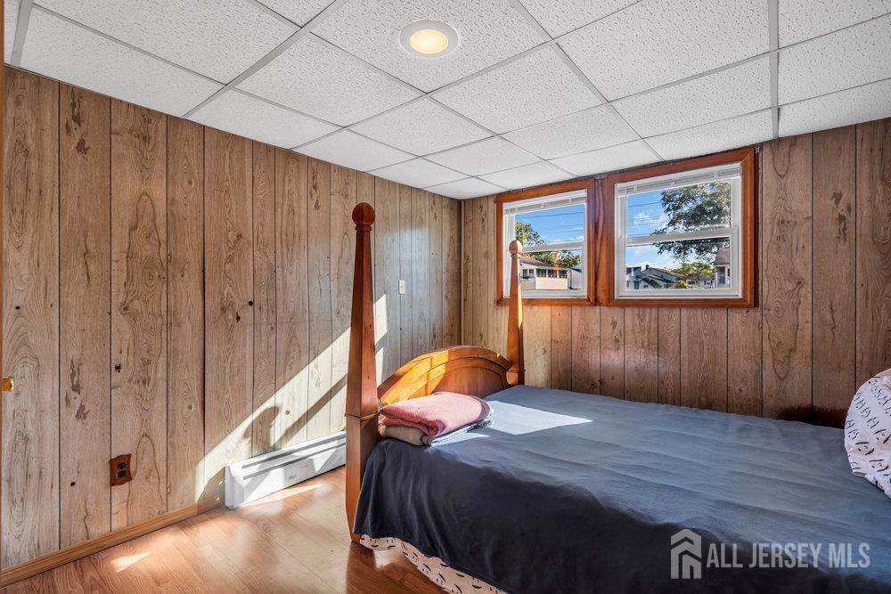 73 Webb Drive Fords, NJ 08863 - Photo 37 of 65 a bedroom with a bed and a window