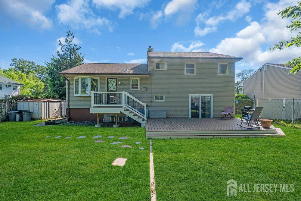 73 Webb Drive Fords, NJ 08863 - Photo 46 of 65 a view of a house with a yard porch and sitting area
