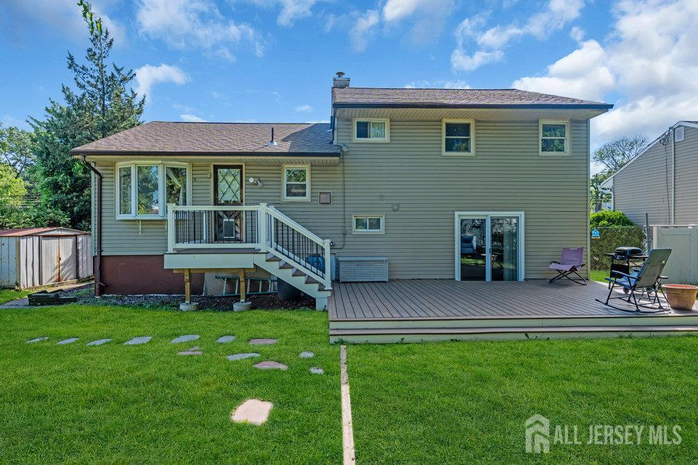 73 Webb Drive Fords, NJ 08863 - Photo 47 of 65 a view of a house with a yard porch and sitting area