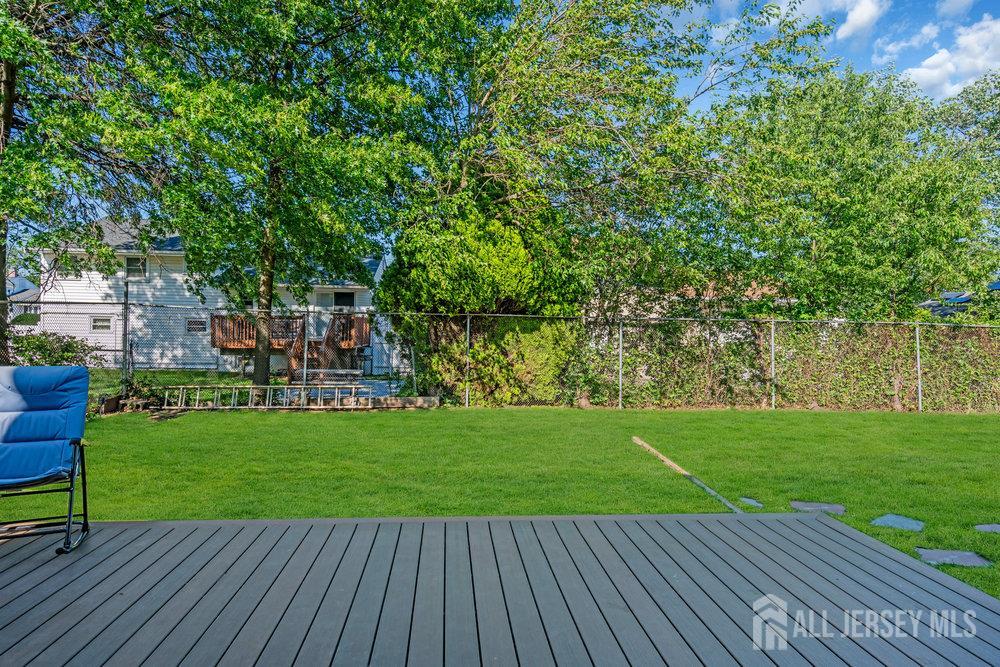 73 Webb Drive Fords, NJ 08863 - Photo 49 of 65 a view of a chairs and table on the wooden floor