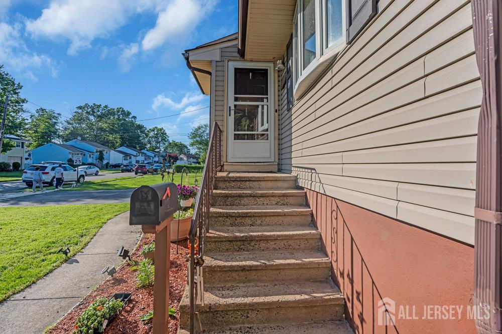 73 Webb Drive Fords, NJ 08863 - Photo 51 of 65 a view of a house with a small yard